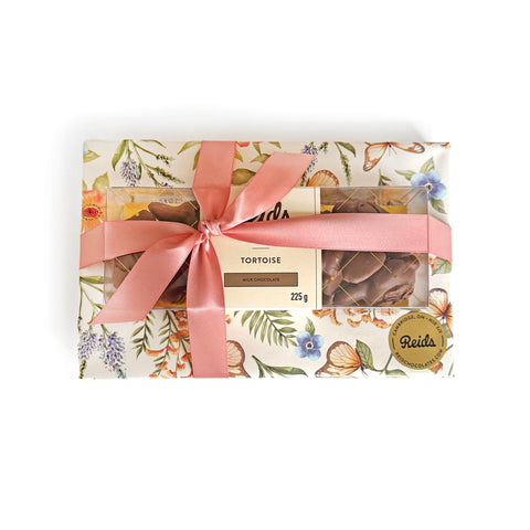 Our signature 1/2  lb Tortoise with the ever popular 1 lb assorted chocolates all dressed up for the Easter holiday.