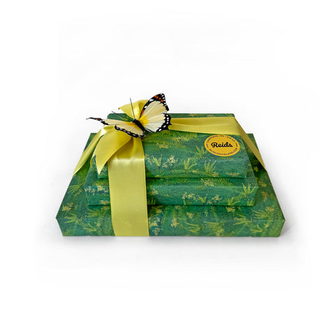 1/2 lb Fancy Mix Nuts, 1/2 lb Assorted Chocolates, 1 lb of our Signature Tortoises, all dressed up for the Easter holiday.