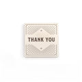 100 g thank you box image. Cream box with brown thank you, and decorative lines