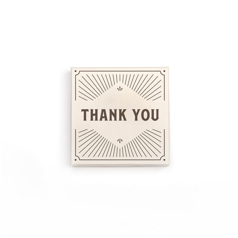 100 g thank you box image. Cream box with brown thank you, and decorative lines