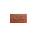 A small milk chocolate bar that says happy holidays