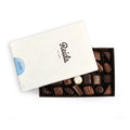 Box of milk and dark hard centred assorted chocolates