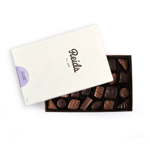 Box of milk and dark soft centred assorted chocolates