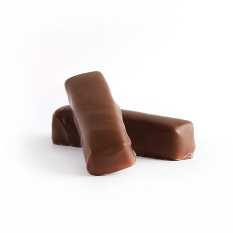 A product photo of two milk chocolate caramel sticks