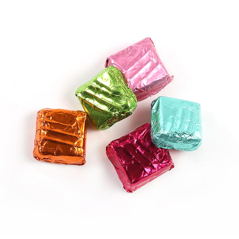 Product photo of square mint patties in a variety of coloured foils