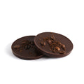 Product photo of dark chocolate mocha delight. Round patty topped with whole coffee beans