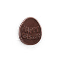 Solid chocolate molding in an egg shape with happy easter written on top.