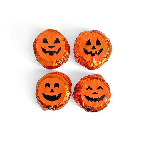 Marshmallow and caramel covered in milk chocolate, dressed up for halloween!