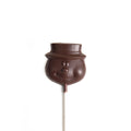 Product photo of dark chocolate snowman head mold on a stick
