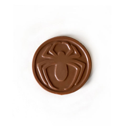 A milk chocolate spider disc.